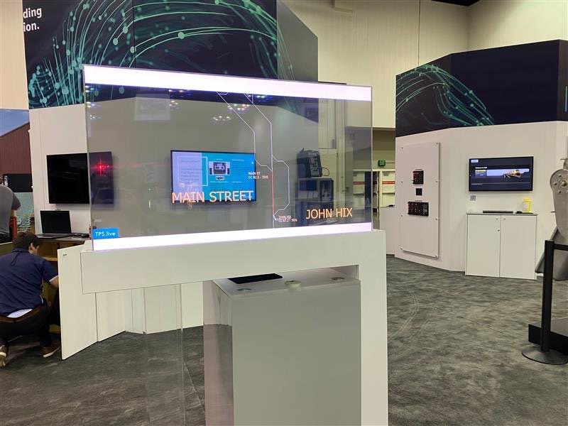 Siemens booth — transparent display with live railroad track visualization